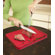 Joseph Joseph Small Cut and Carve Chopping Board in Red
