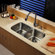 Kraus 32 inch Undermount Double Bowl Stainless Steel Kitchen Sink with Kitchen Faucet and Soap Dispenser