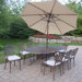 Mississippi Oval 9 Piece Dining Set with Cushions and Umbrella