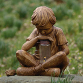 Boy with Firefly Statue