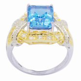18K Gold and Silver Emerald Cut Topaz and Cubic Zirconia Ring