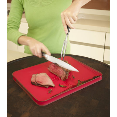 Joseph Joseph Small Cut and Carve Chopping Board in Red