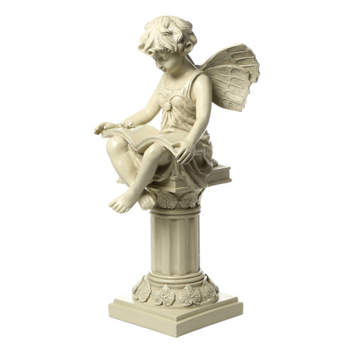 british reading fairy statue